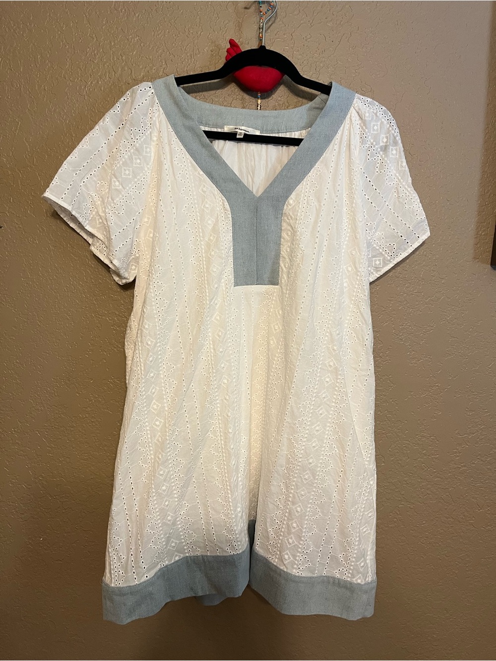 White Eyelet Mini Dress with chambray blue trim.